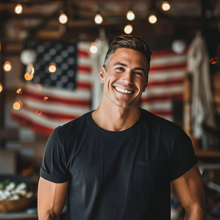 files/smiling-man-black-shirt-standing-front-american-flag_1034574-90412.webp